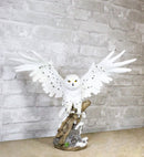 Winter Snowy Owl with Outsretched Wings on Snow-Covered Tree Stump Statue 14"H