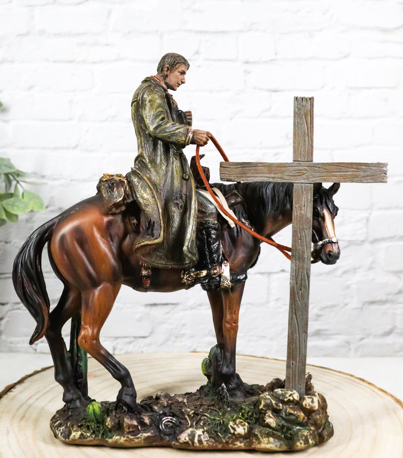 Western Cowboy in Solemn Prayer On Horse By Faded Cross And Cactus Figurine
