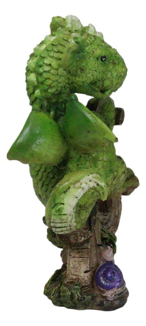 Fantasy Green Wyrmling Baby Dragon Riding A Wooden Log Cavebike Bicycle Figurine