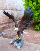 Large Bald Eagle Figurine with Outstretched Wings Taking Flight from Tree Branch