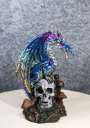 Metallic Blue Dragon with Purple Spikes Perching On Oversized Skull Figurine