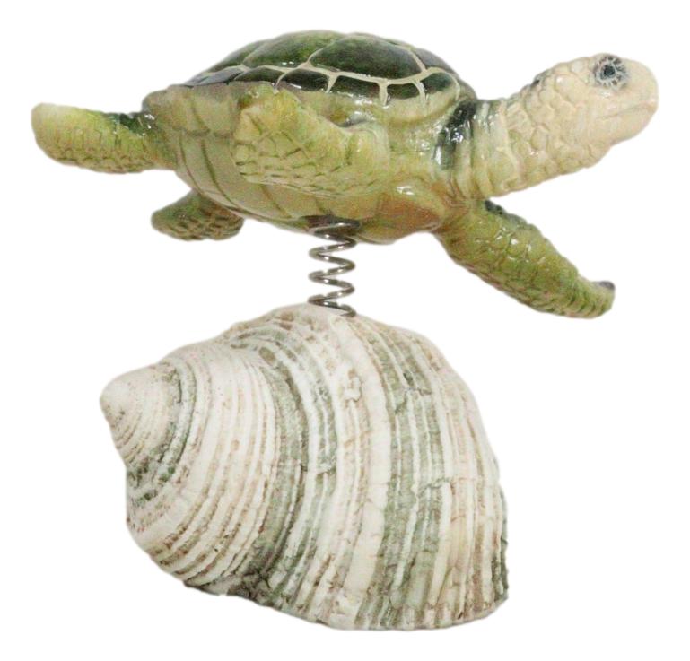 Marine Green Sea Turtle Swimming Over Partridge Tun Shell Spring Bobble Figurine