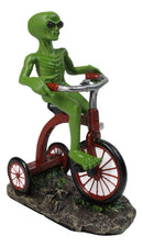 'Space Travel' UFO Green ET Roswell Alien Riding A Red Tricycle Figurine 6.75"H