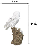 Snowy Owl Mother with Two Owlets Family Figurine on Snow-Covered Tree Stump