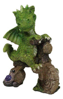 Fantasy Green Wyrmling Baby Dragon Riding A Wooden Log Cavebike Bicycle Figurine