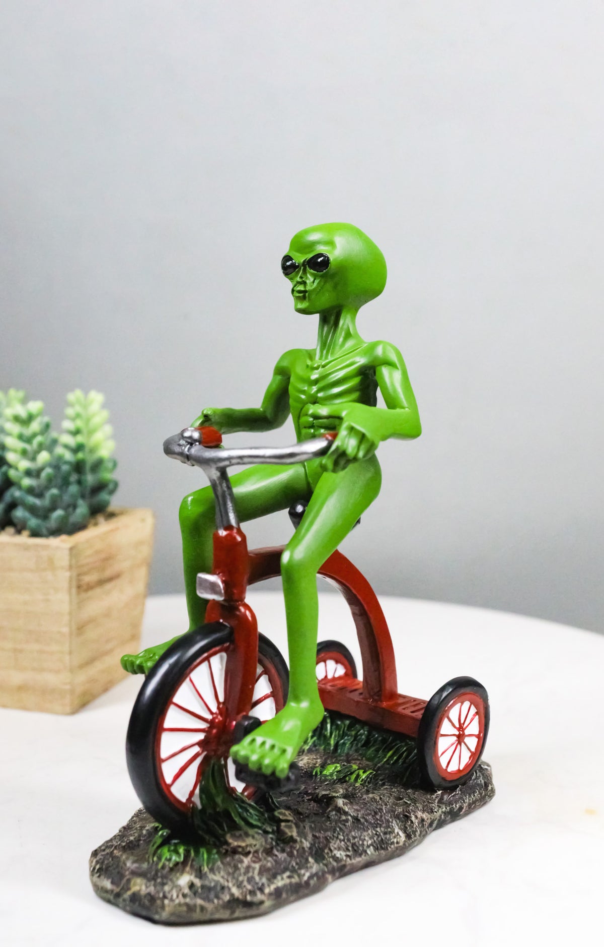 'Space Travel' UFO Green ET Roswell Alien Riding A Red Tricycle Figurine 6.75"H