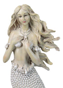Marine Vintaged Pearly White Ariel Mermaid Sitting On Sea Rock Figurine 16" H