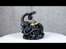 Coiled Attacking Snake On Mound of Skulls at Crystal Rock Quarry Figurine