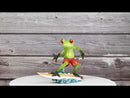 Green Surfer Toad Frog in Red Shorts Riding Ocean Waves With Surfboard Figurine