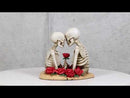Love Never Dies Skeleton Couple Holding A Stalk of Rose Figurine Cake Topper