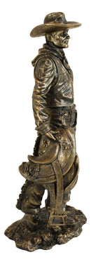 Old World Rustic Western Cowboy Holding Horse Saddle and Rifle Gun Statue 12"H