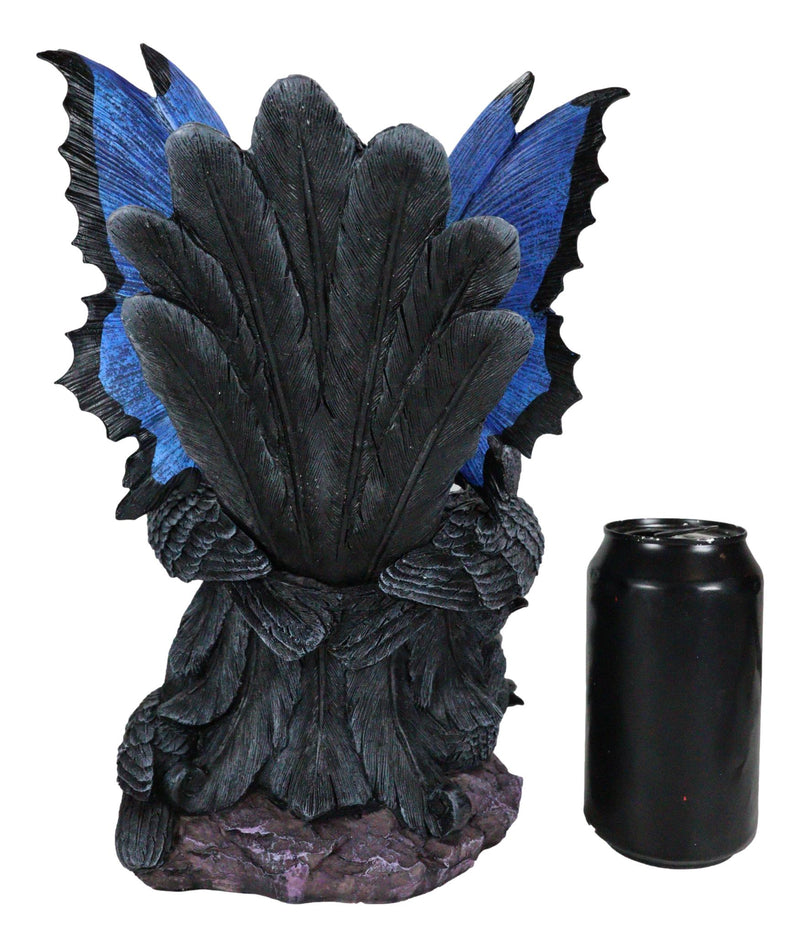 Gothic Raven Crow Fairy Queen in Blue Gown Sitting On Throne of Crows Statue