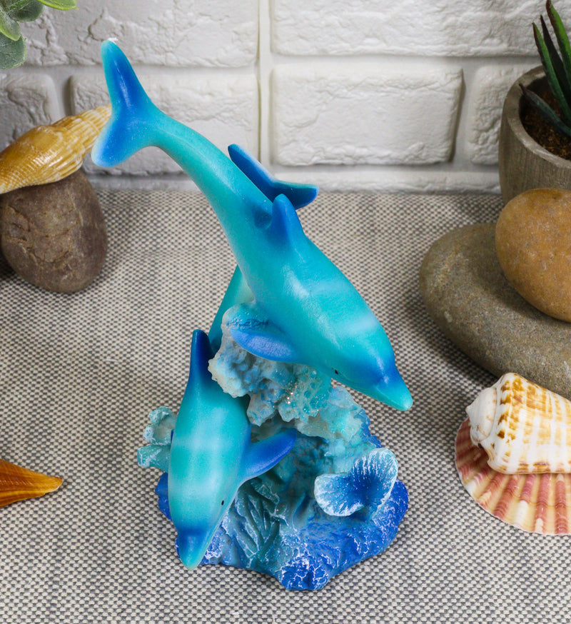Marine Life Ocean Two Blue Dolphins Swimming Around Coral Reef Statue Sea World