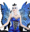 Gothic Raven Crow Fairy Queen in Blue Gown Sitting On Throne of Crows Statue