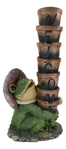 Ebros Green Frog Toad With Pink Hat Juggling Pots Stack With Welcome Sign Figurine 14"