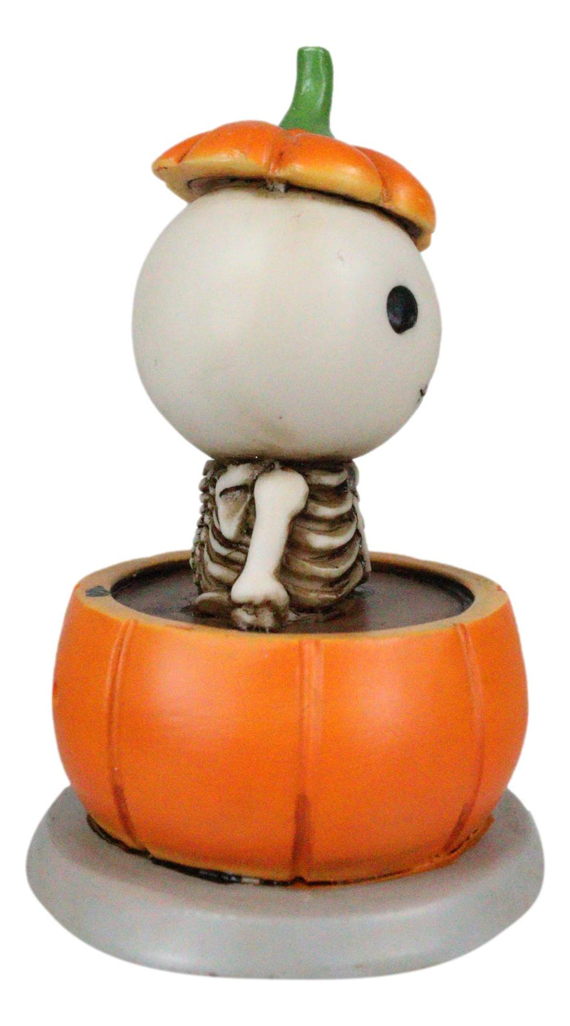 Lucky The Skeleton Jack O Lantern Bathing in Chocolate Soup Pumpkin Figurine