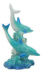 Marine Life Ocean Two Blue Dolphins Swimming Around Coral Reef Statue Sea World