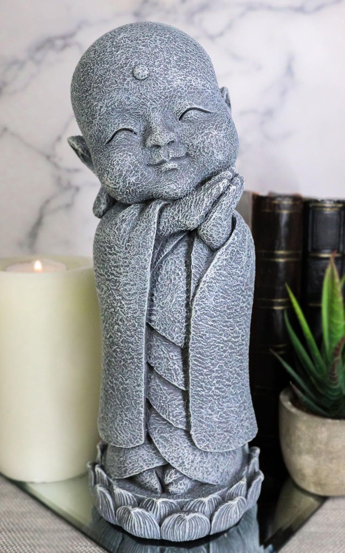Ebros Japanese Jizo Monk Standing On Lotus Figurine 9.75"H (Hands On Left Cheek)