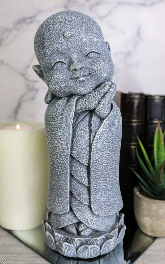 Ebros Japanese Jizo Monk Standing On Lotus Figurine 9.75"H (Hands On Left Cheek)