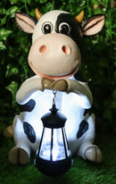 Ebros Country Farm Whimsical Holstein Cow Statue Holding Solar LED Lantern Light 14"H