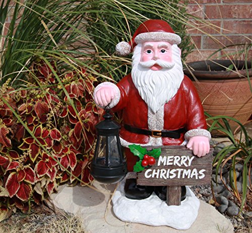 Ebros Jolly Seasons Merry Christmas Santa Claus Holding Greeting Sign Decorative Statue With Solar LED Light Lantern Lamp 16.5"H As Home Patio Welcome Entrance Decor Guest Greeter Figurine