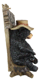 Ebros Angry Black Bear Holding Rifle 15"H Statue With Welcome or Go Away Plank Sign