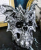 Flying Dragon On Ossuary Morphing Skull with Celtic Tribal Patterns Figurine