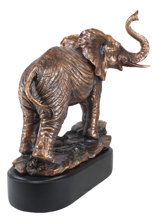 Ebros Large African Long Tusked Elephant Marching W/ Trunk Raised Statue W/ Base - Ebros Gift