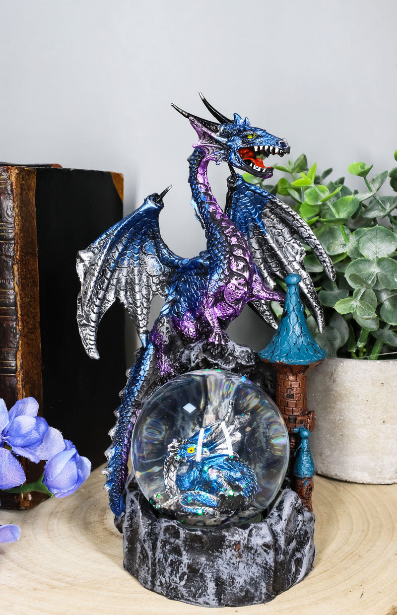 Metallic Blue Dragon On Cliff Rocks Castle With A Wyrmling Water Globe Statue