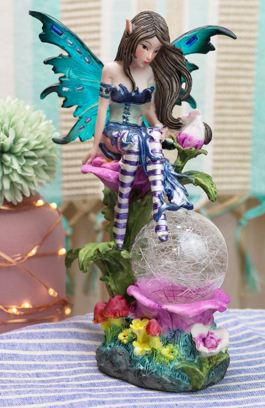Ebros Butterfly Elf Pixie Fairy Sitting On Flower With LED Night Light Ball Figurine - Ebros Gift