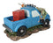 Buck Deer With Rifle In Blue Pick Up Truck With Tied Up Hunter On Hood Figurine