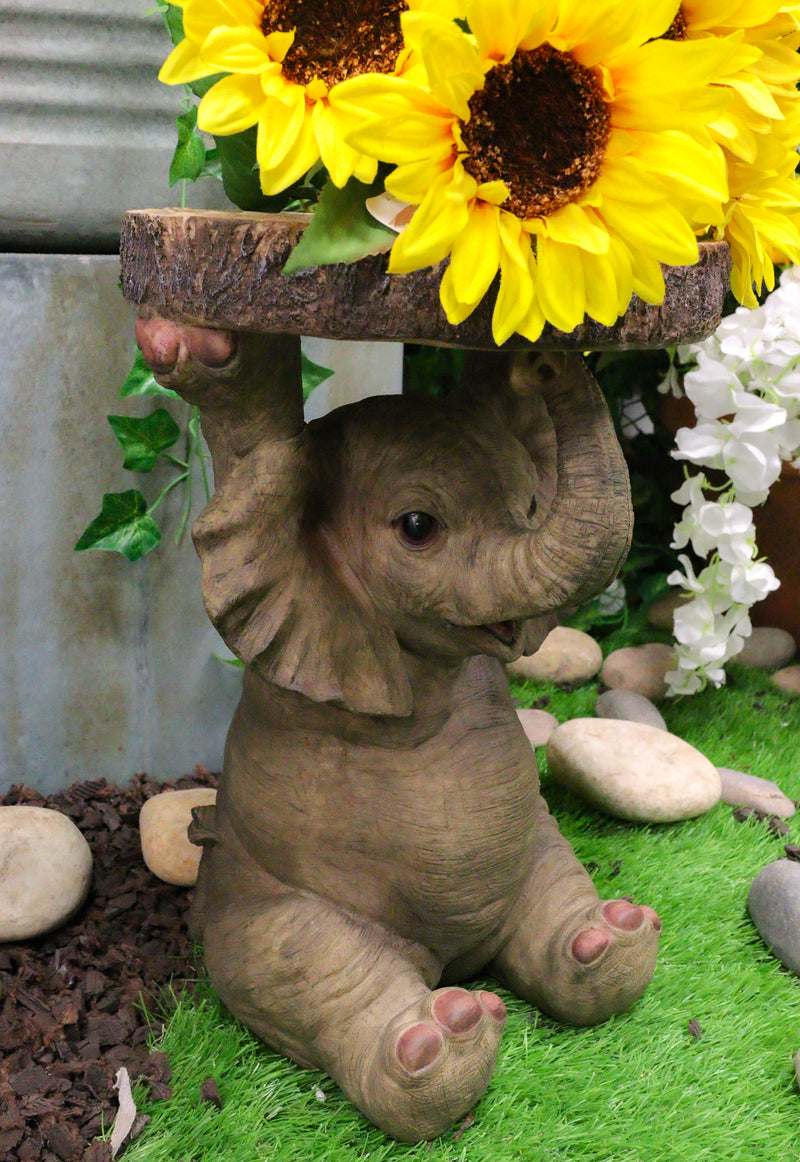Safari Jungle Baby Calf Elephant Holding Faux Wood Slice Table Stand Figurine