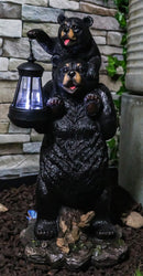 Ebros Rustic Black Bear Carrying Cub On Shoulder Statue 18.75"Tall With Solar LED Lantern Light Bear Family Guest Greeter"This Little Light Of Mine" Realistic Wildlife Black Bear Decor