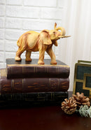 Safari Savannah Landscape Majestic Elephant With Trunk Up Faux Wood Figurine
