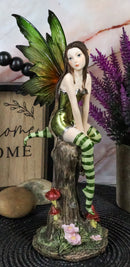 Whimsical Peppermint Elf Fairy Sitting On Tree Stump Statue 9.5"Tall Collectible