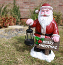 Ebros Jolly Seasons Merry Christmas Santa Claus Holding Greeting Sign Decorative Statue With Solar LED Light Lantern Lamp 16.5"H As Home Patio Welcome Entrance Decor Guest Greeter Figurine