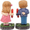 Ebros Love at First Sight Boy & Girl Kissing and Holding Split Red Heart Statue