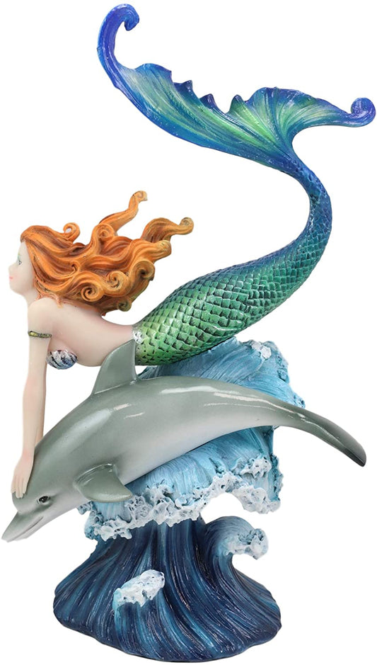 Ebros Red Haired Mermaid Riding Dolphin Over The Ocean Waves Figurine 10.25" H