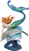 Ebros Red Haired Mermaid Riding Dolphin Over The Ocean Waves Figurine 10.25" H