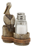Ebros Gift 5.25" Tall Ocean Marine Beach Coastal Diving Brown Pelican Perching On Getty Posts Salt and Pepper Shakers Display Holder Statue Home Decor Birds Pelicans Nature As Kitchen Centerpiece