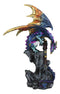 Metallic Blue Iridescent Dragon Protecting Castle On Mountain Cliff Figurine