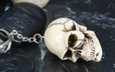 Pack of 12 Novelty Bone Colored Jointed Homosapien Cranium Skulls Keychains