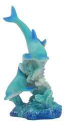 Marine Life Ocean Two Blue Dolphins Swimming Around Coral Reef Statue Sea World