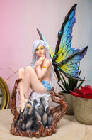 Dryad Nomad Budding Vines Winged Nude Fairy With Blue Florals On Rock Figurine