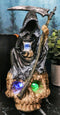 Faceless Grim Reaper Skeleton On Colorful LED Eyes Morphing Skull Figurine