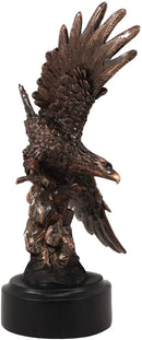 Ebros 9.25" Tall Wings of Glory Swooping Broad Winged Bald Eagle by Cliff Rocks Statue Bronze Electroplated Resin Figurine with Base USA Patriotic Home and Office Decor Flying Wild Life Eagles