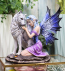 Ebros Fairy With Wolf 6.25"H Primrose Fairy Kneeling With Arctic Wolf Figurine