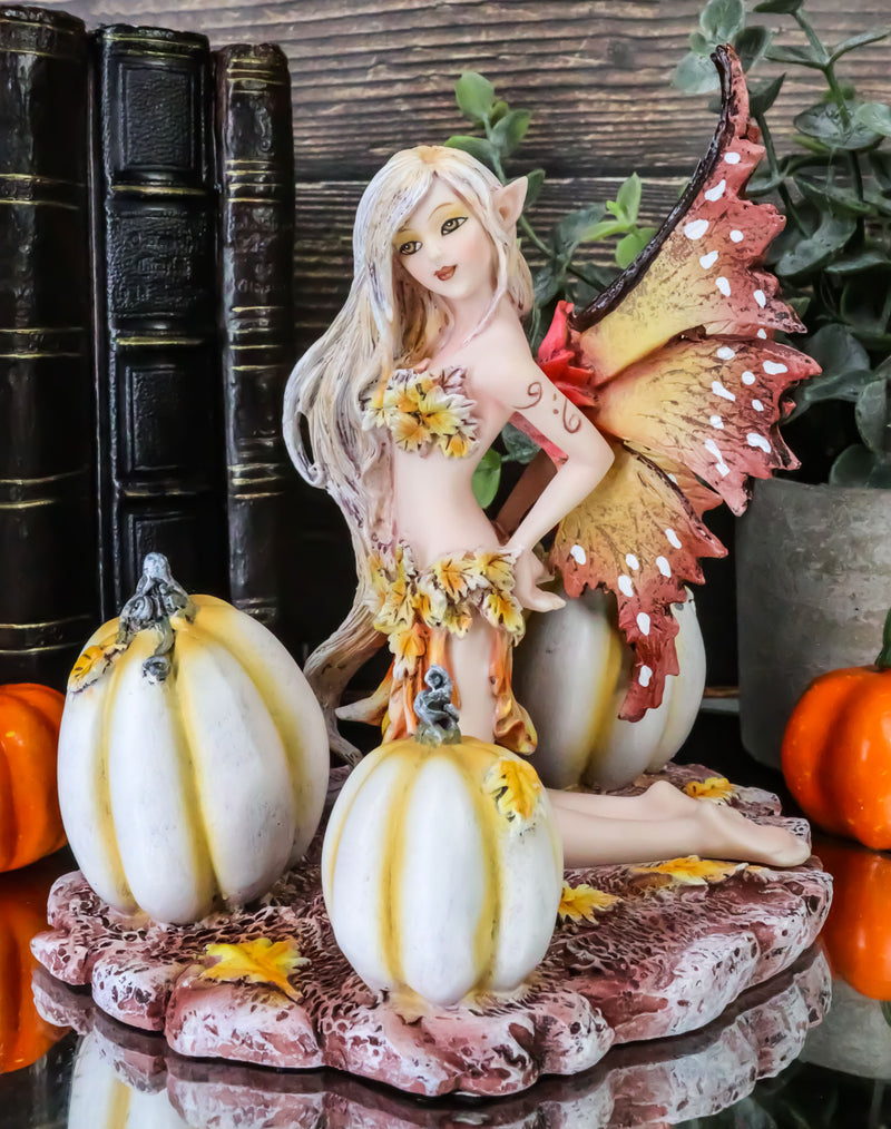 Ebros Amy Brown Autumn Maple Elf Fairy with White Pumpkins Statue 5" Long