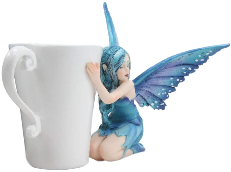 Ebros Amy Brown Warmth Comfort Blue Fairy Hugging Tea Cup Statue 4.25"H Fantasy