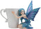 Ebros Amy Brown Warmth Comfort Blue Fairy Hugging Tea Cup Statue 4.25"H Fantasy